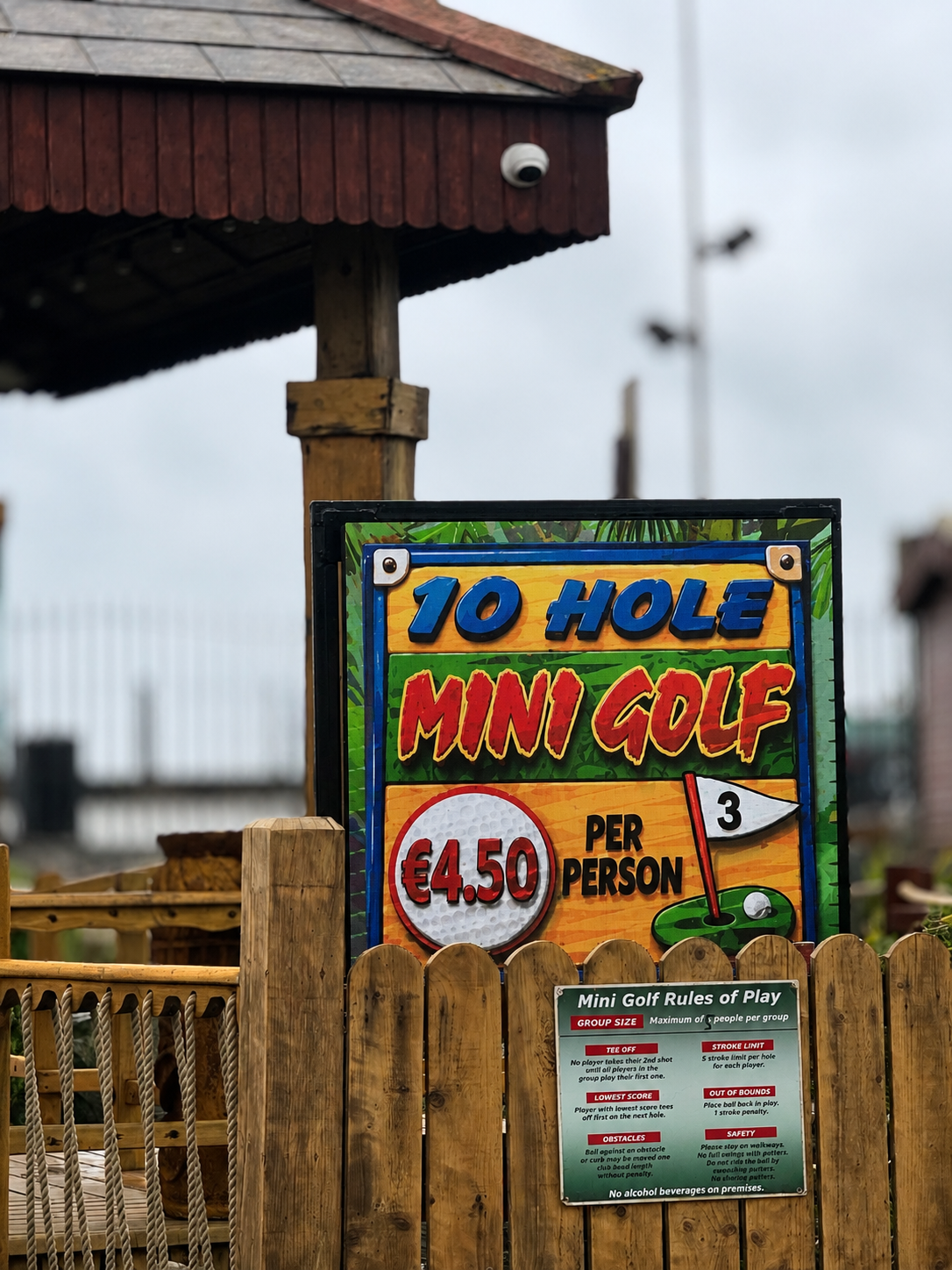 Outdoor digital screen displaying mini golf admission prices